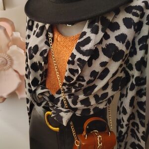 Leopard Print Blazer with Orange Top and Black Hat